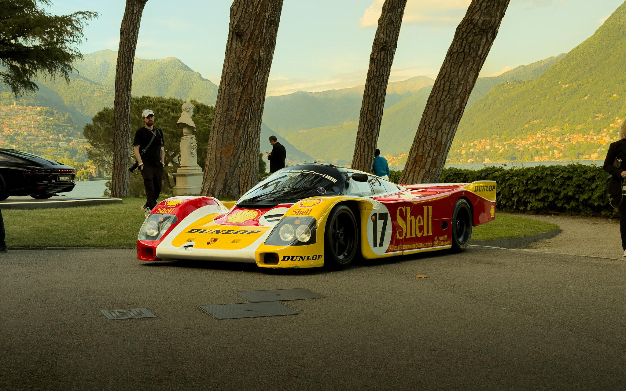 Porsche 962C in Shell-Dunlop colours under the pines at Villa del Grumello